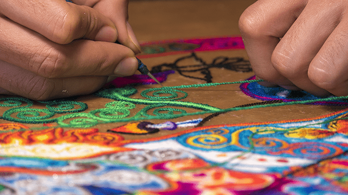 Table de fils Huichol.- Réalisation