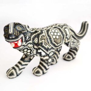 Jaguar walking huichol art